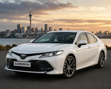 White Toyota Camry sedan in the Glen Eden Taxi Auckland fleet